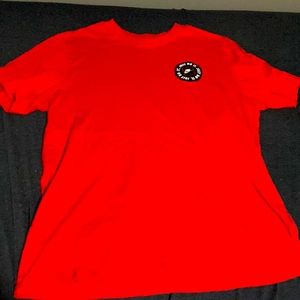 Red Nike T L